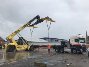 crane lifting heavy beams 