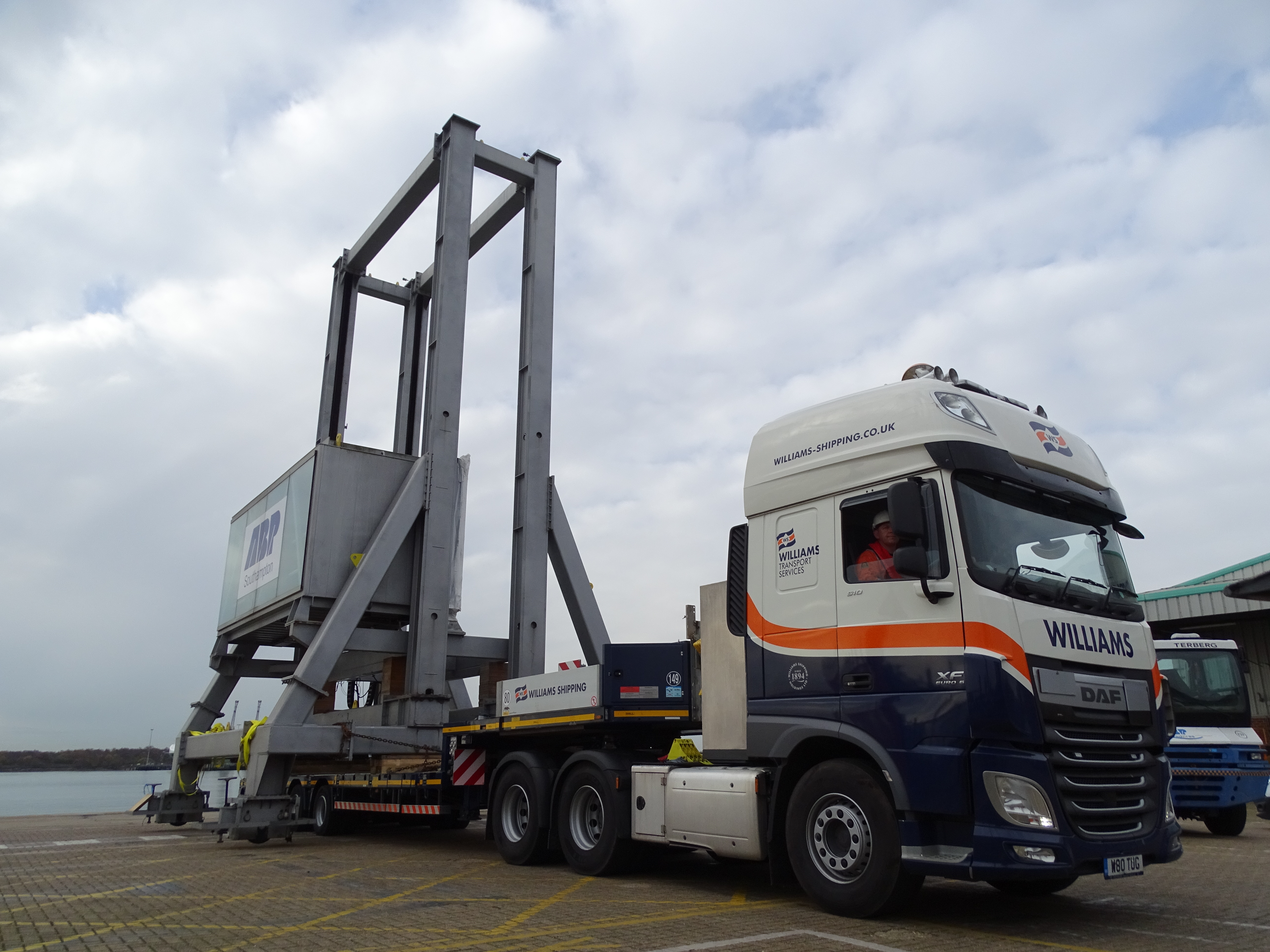 truck delivering heavy construction