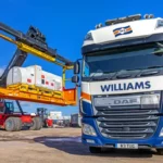 Flatrack being loaded onto truck